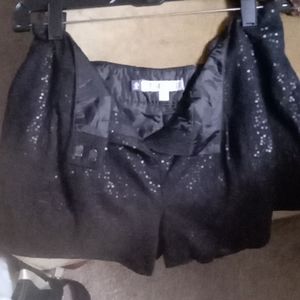 Jennifer Lopez sequin black shorts,size 6,and dots size 9 ankle boots.